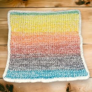 Rainbow and crème crochet baby blanket